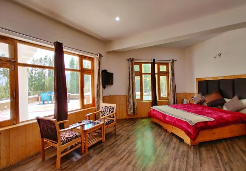 Letto o letti in una camera di Glacier View Guest House