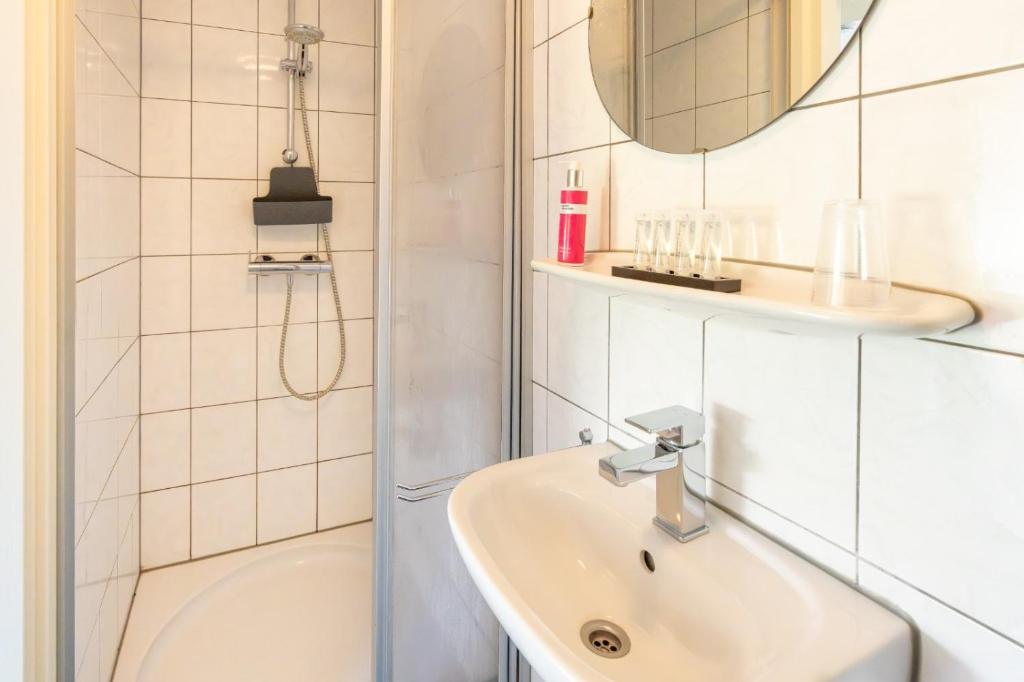 Koupelna v ubytování B&B Plompetorenzicht