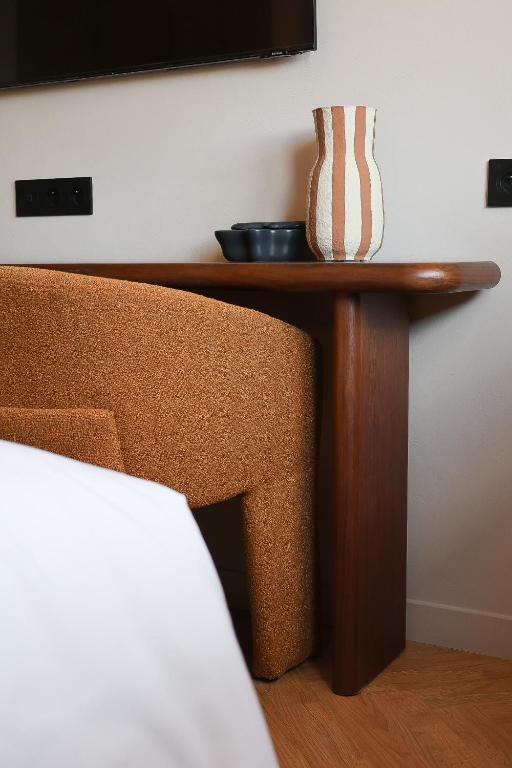 Postel nebo postele na pokoji v ubytování Hotel & Restaurants - Maison Chabran