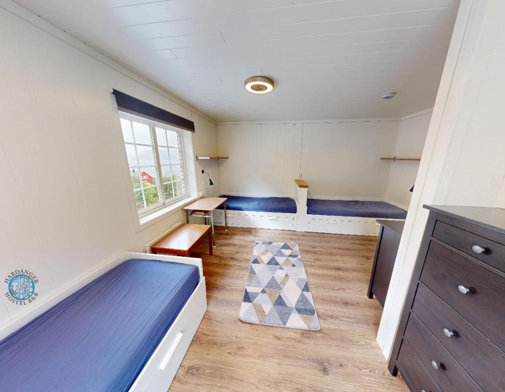Postel nebo postele na pokoji v ubytování Hardanger Hostel B&B
