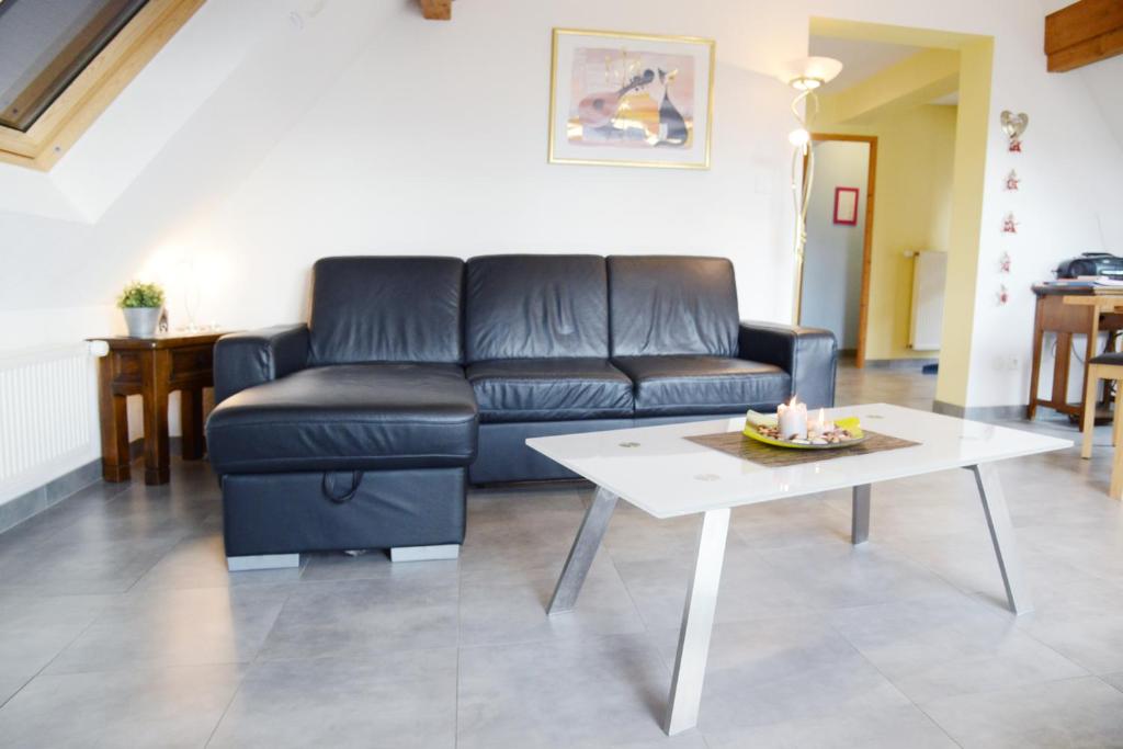 Posezení v ubytování La maison du Vignoble