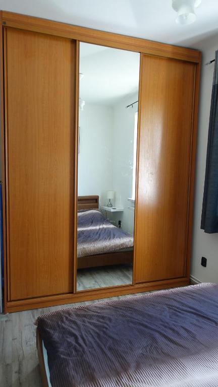 Posteľ alebo postele v izbe v ubytovaní Apartament 3D