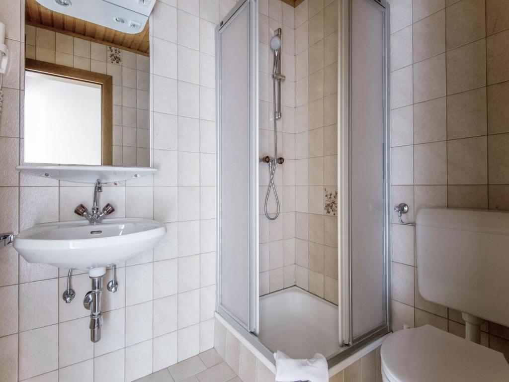 Koupelna v ubytování detached modern holiday home with sauna in the Salzburgerland