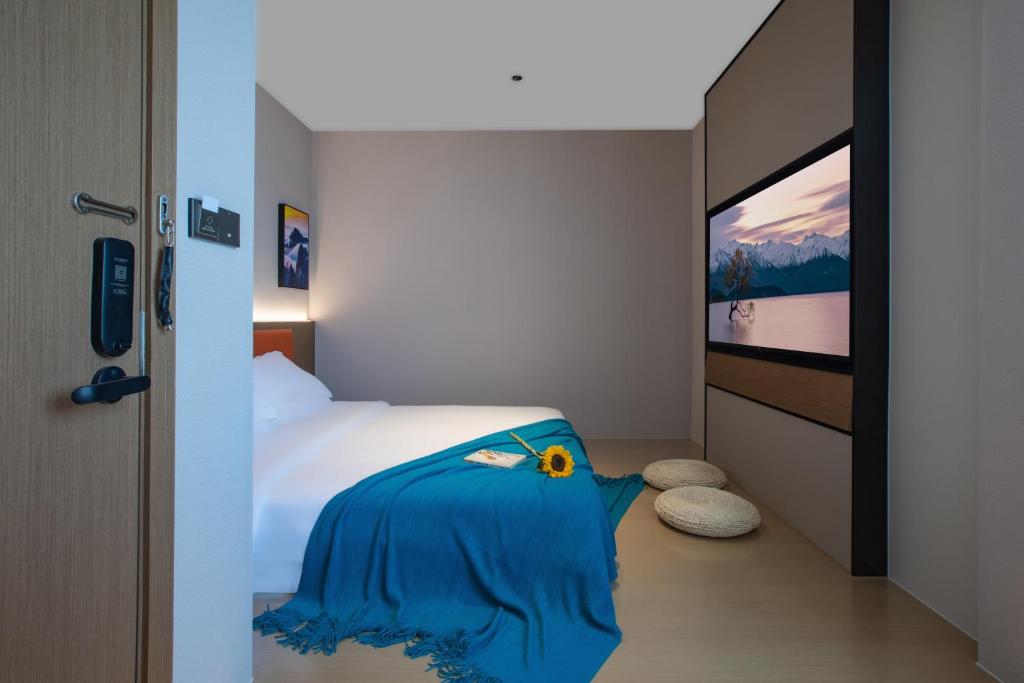 Postel nebo postele na pokoji v ubytování ME Hotel