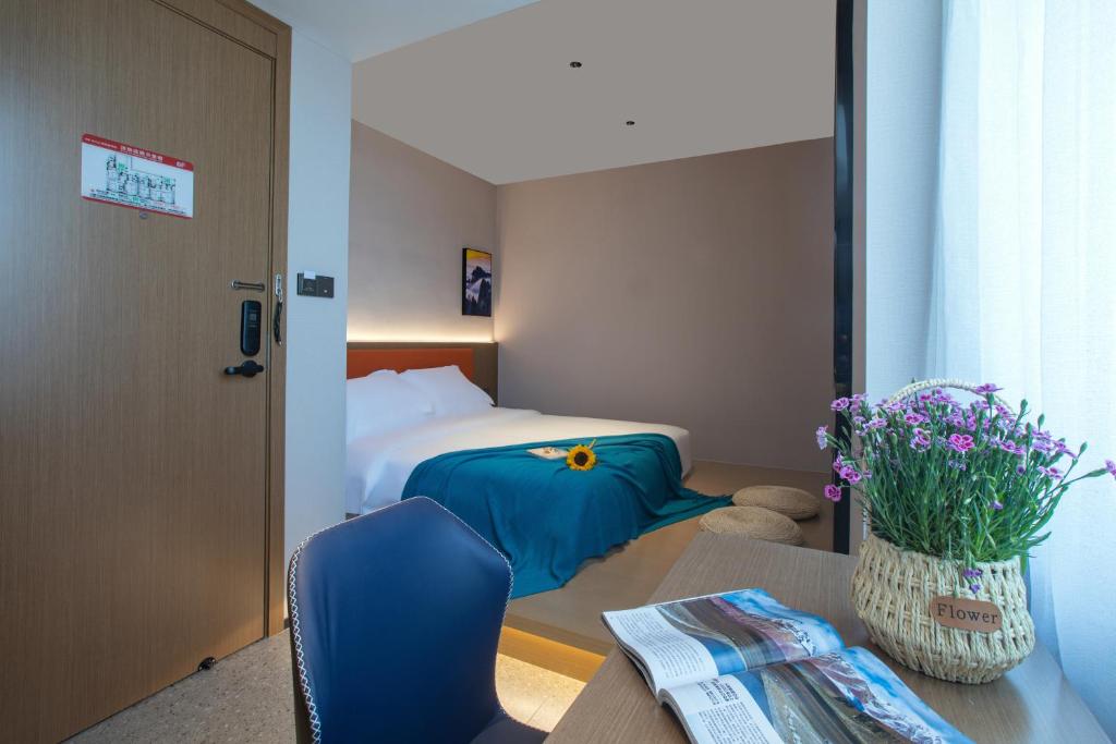 Postel nebo postele na pokoji v ubytování ME Hotel