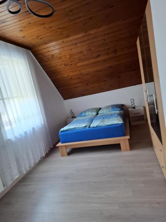 Postel nebo postele na pokoji v ubytování Apartmaji PRI JUNESKO