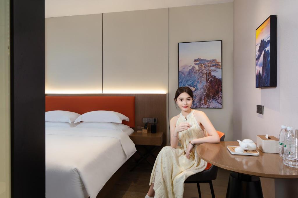 Postel nebo postele na pokoji v ubytování ME Hotel