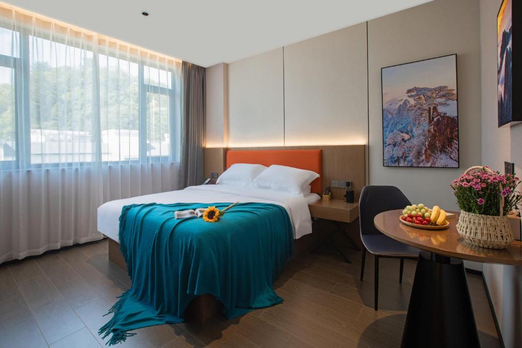 Postel nebo postele na pokoji v ubytování ME Hotel
