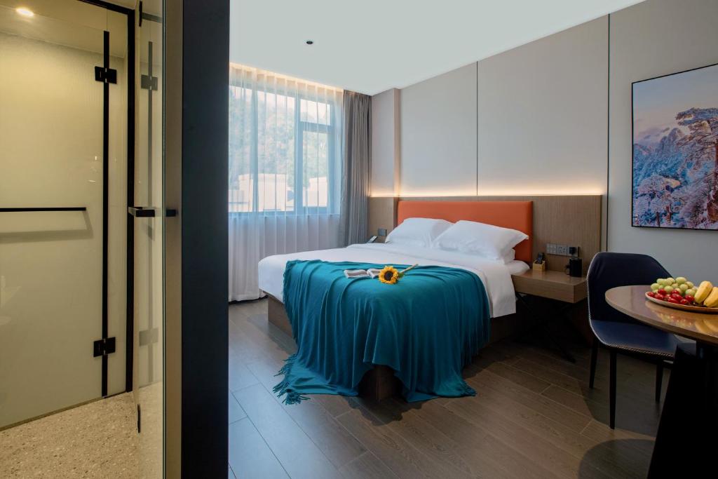 Postel nebo postele na pokoji v ubytování ME Hotel