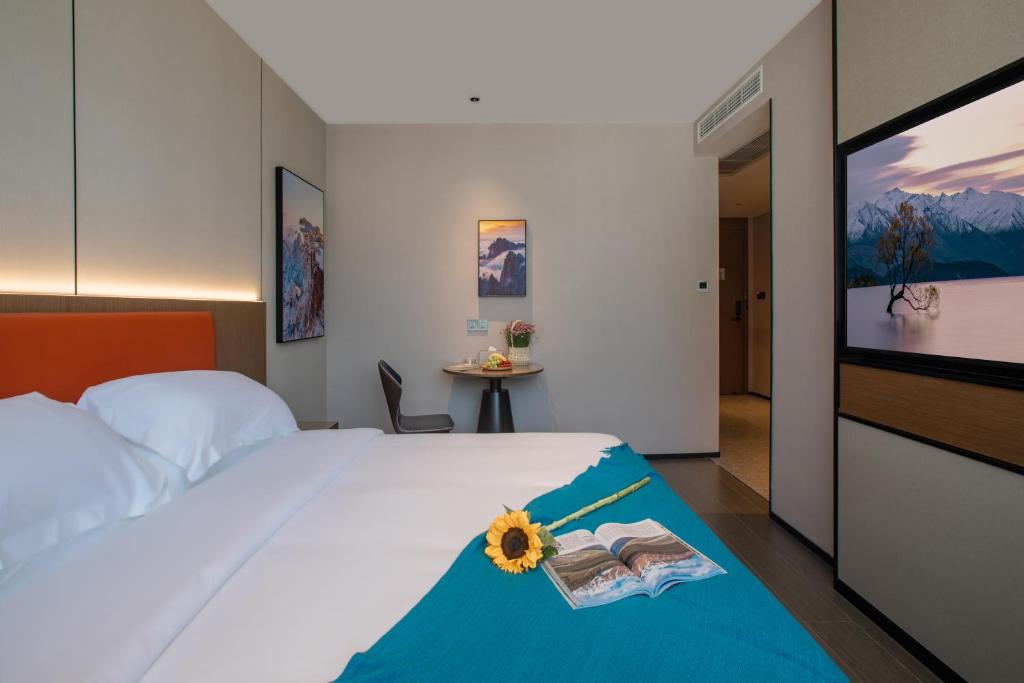 Postel nebo postele na pokoji v ubytování ME Hotel