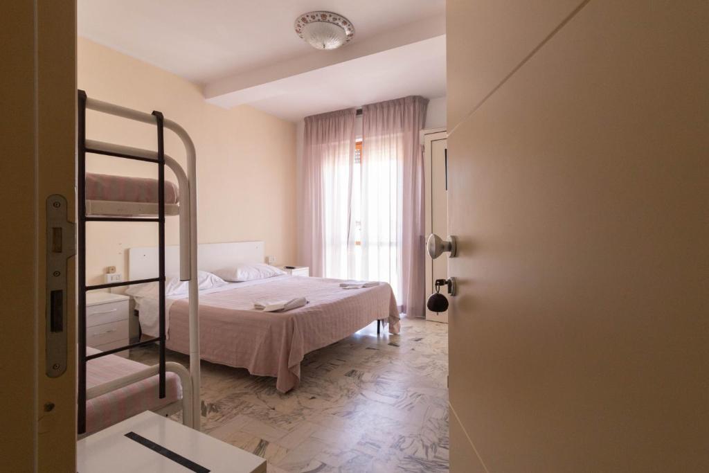 Postel nebo postele na pokoji v ubytování Hotel Altamira