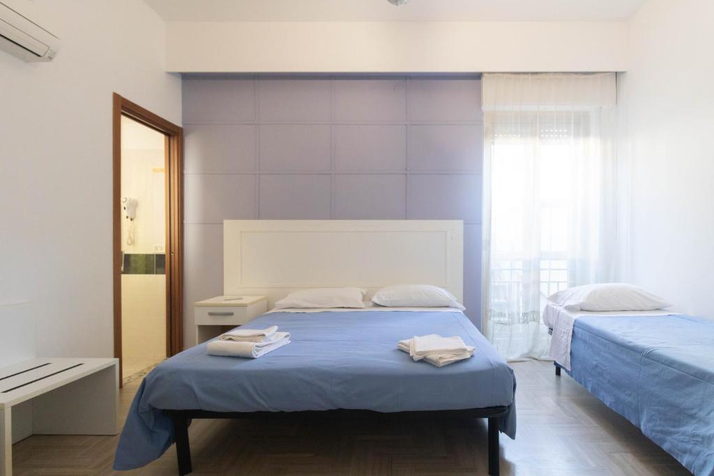 Postel nebo postele na pokoji v ubytování Hotel Altamira