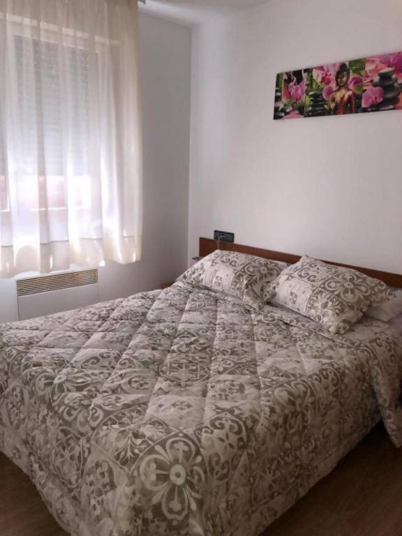 Postel nebo postele na pokoji v ubytování Araco 1E by CONFORTSKY