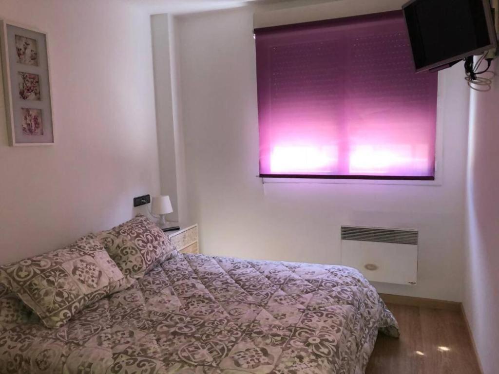 Postel nebo postele na pokoji v ubytování Araco 1D by CONFORTSKY
