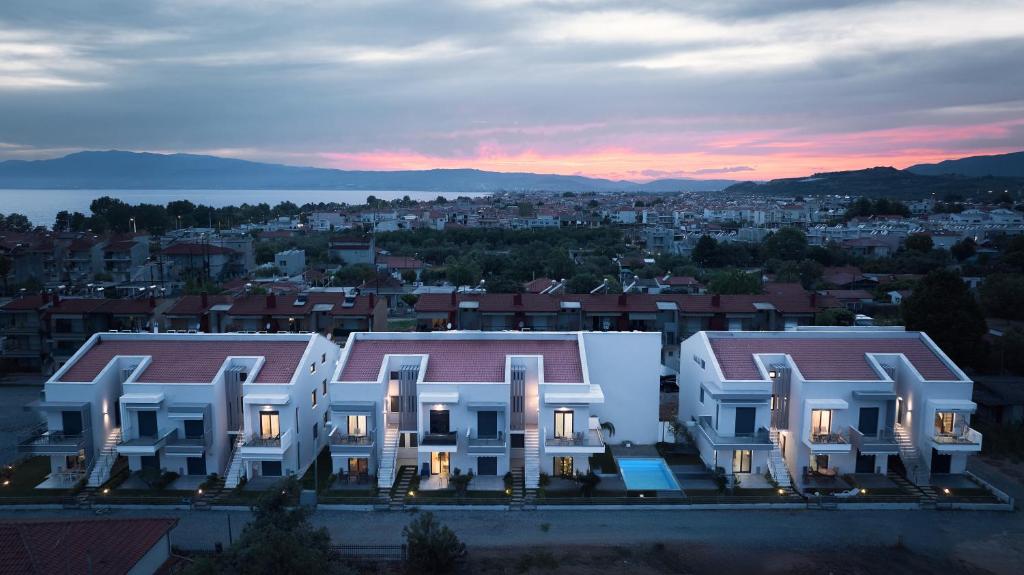 arial view of a building in a city at sunset at Erato Residential Complex in Ofrínion