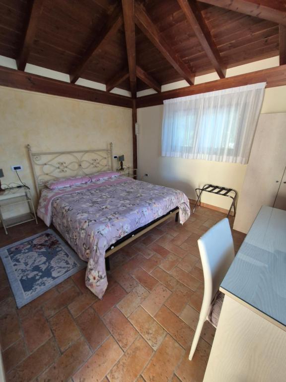 Postel nebo postele na pokoji v ubytování Villa Bigio