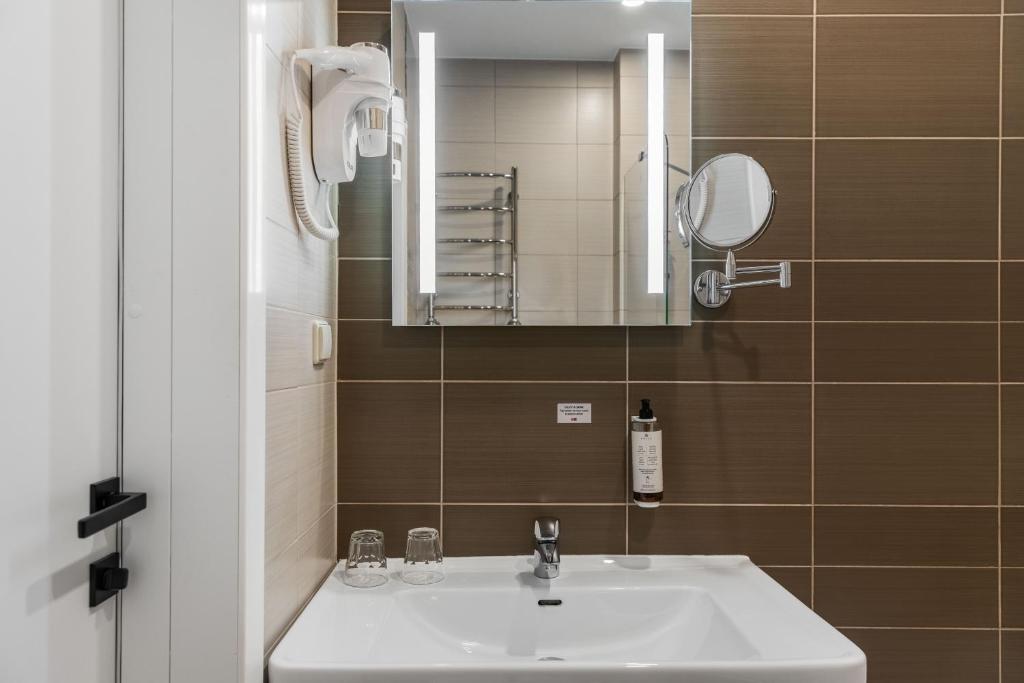 Koupelna v ubytování City Hotels Algirdas