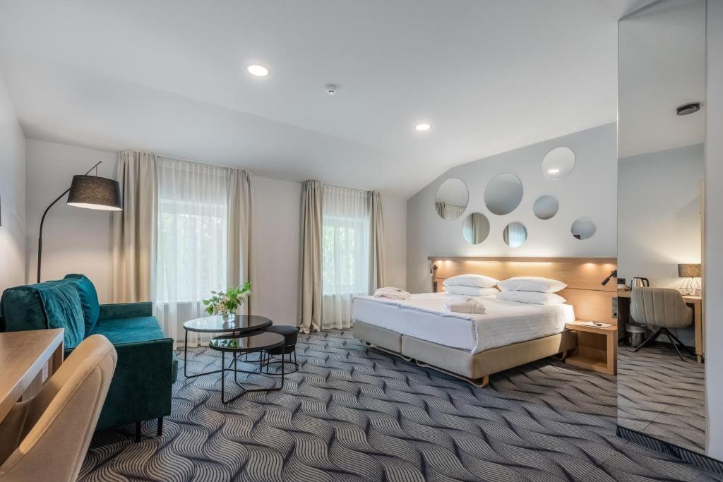 Postel nebo postele na pokoji v ubytování City Hotels Algirdas
