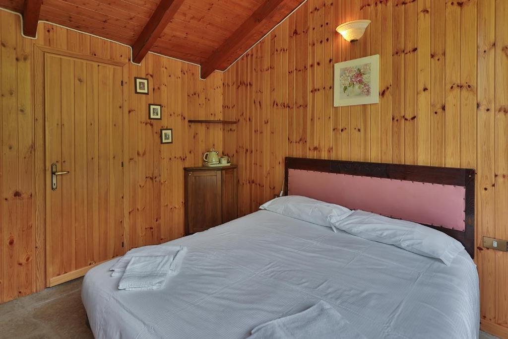 Postel nebo postele na pokoji v ubytování Agriturismo Alberobello