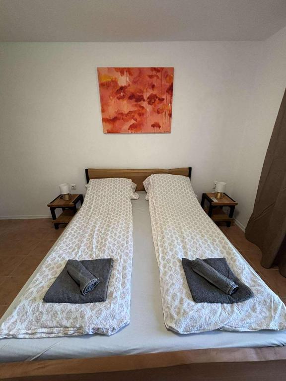 Postel nebo postele na pokoji v ubytování Soti Apartments