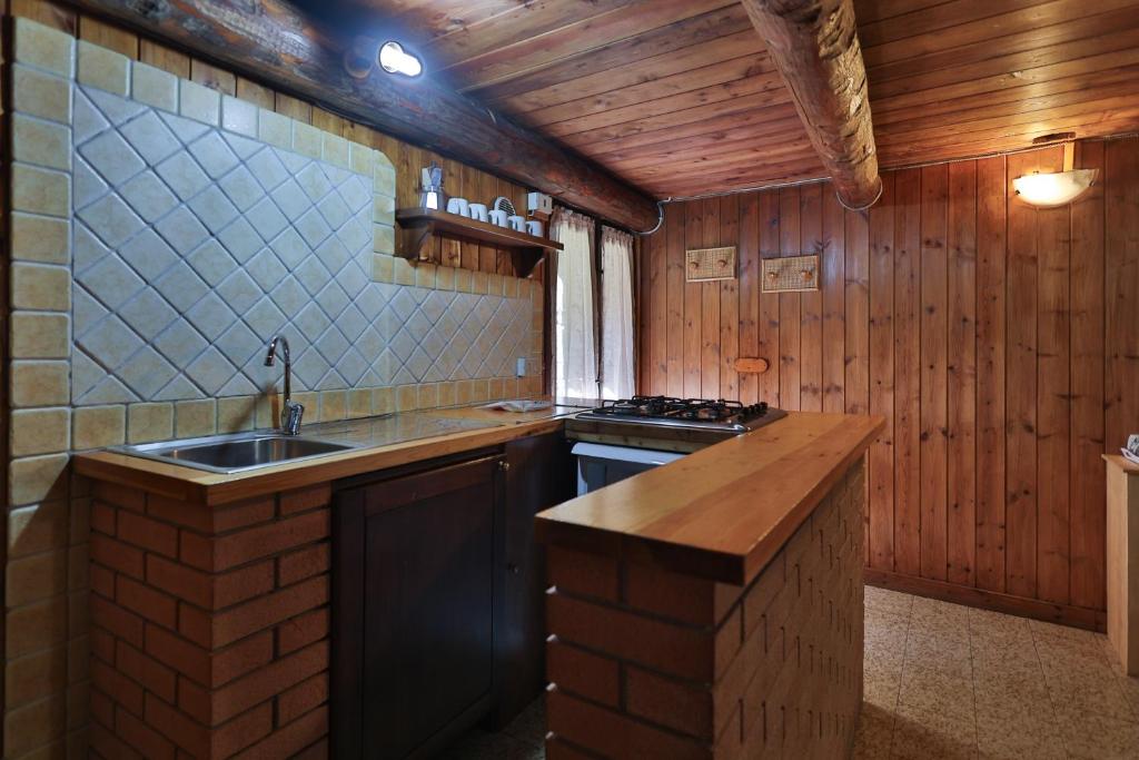 Kuchyň nebo kuchyňský kout v ubytování Agriturismo Alberobello