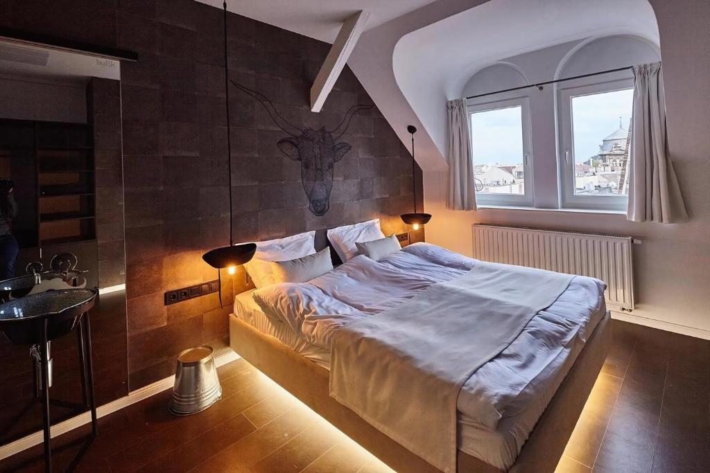 Posteľ alebo postele v izbe v ubytovaní Butik Apartments, by BQA