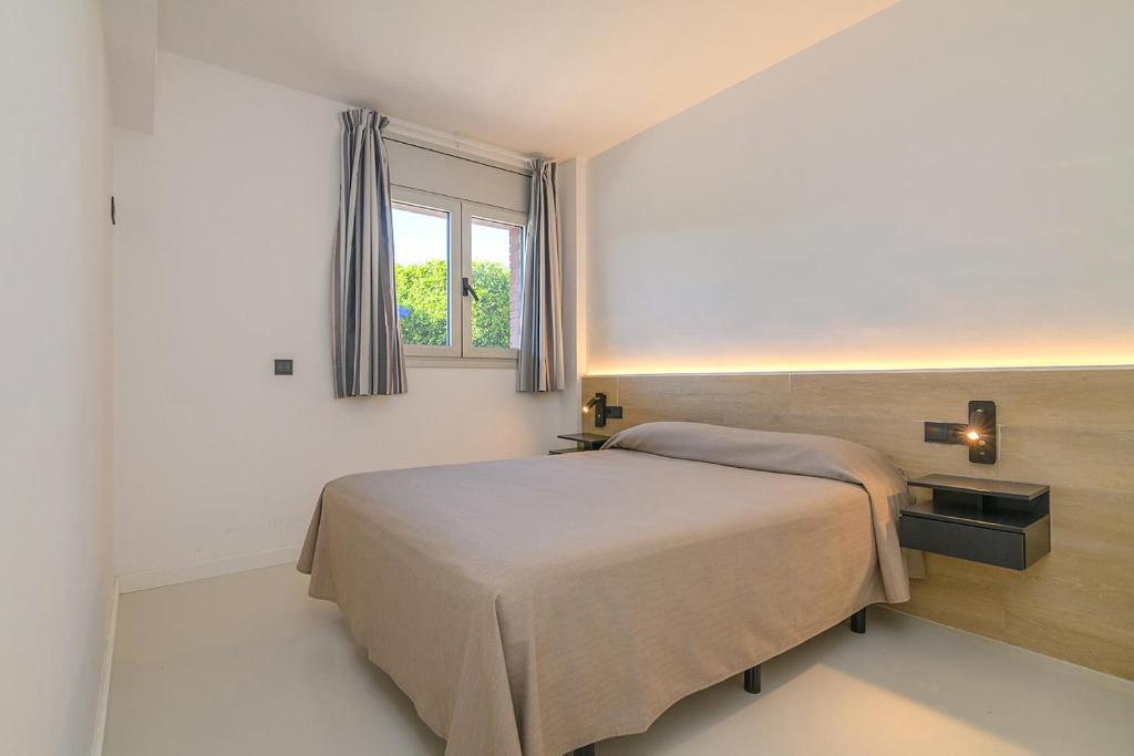 Posteľ alebo postele v izbe v ubytovaní Aparthotel Marsol