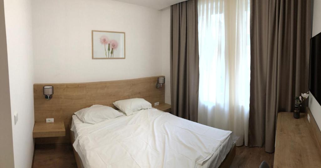 Postel nebo postele na pokoji v ubytování Vila Mila