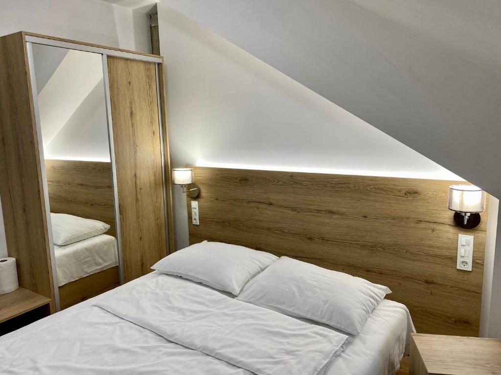 Postel nebo postele na pokoji v ubytování Vila Mila
