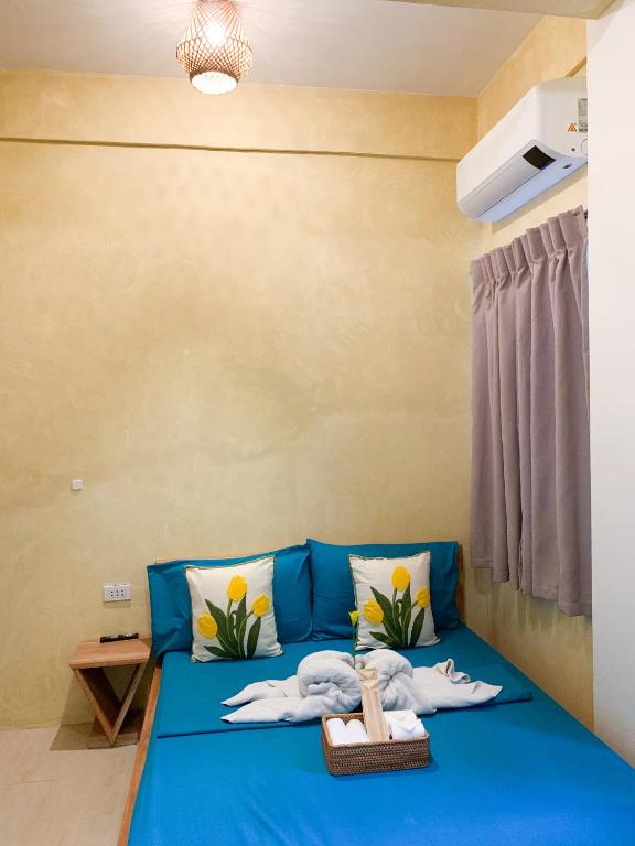 Postel nebo postele na pokoji v ubytování Kalija Homestay