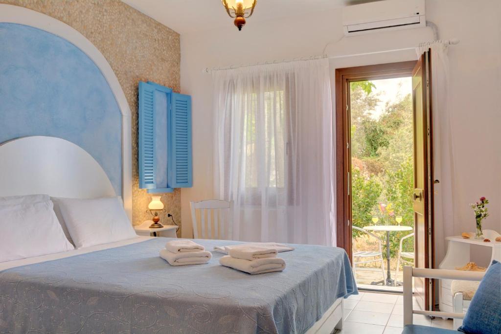 Postel nebo postele na pokoji v ubytování Hotel Agnadi - Horefto