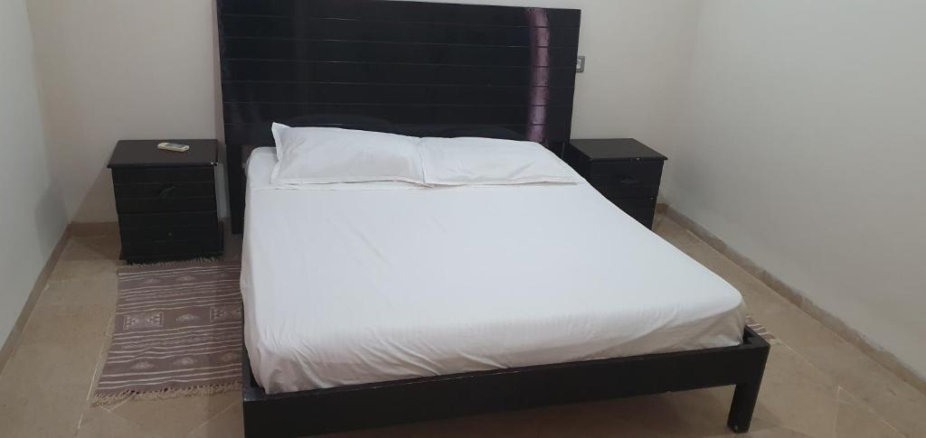 Postel nebo postele na pokoji v ubytování Residence CHAHD