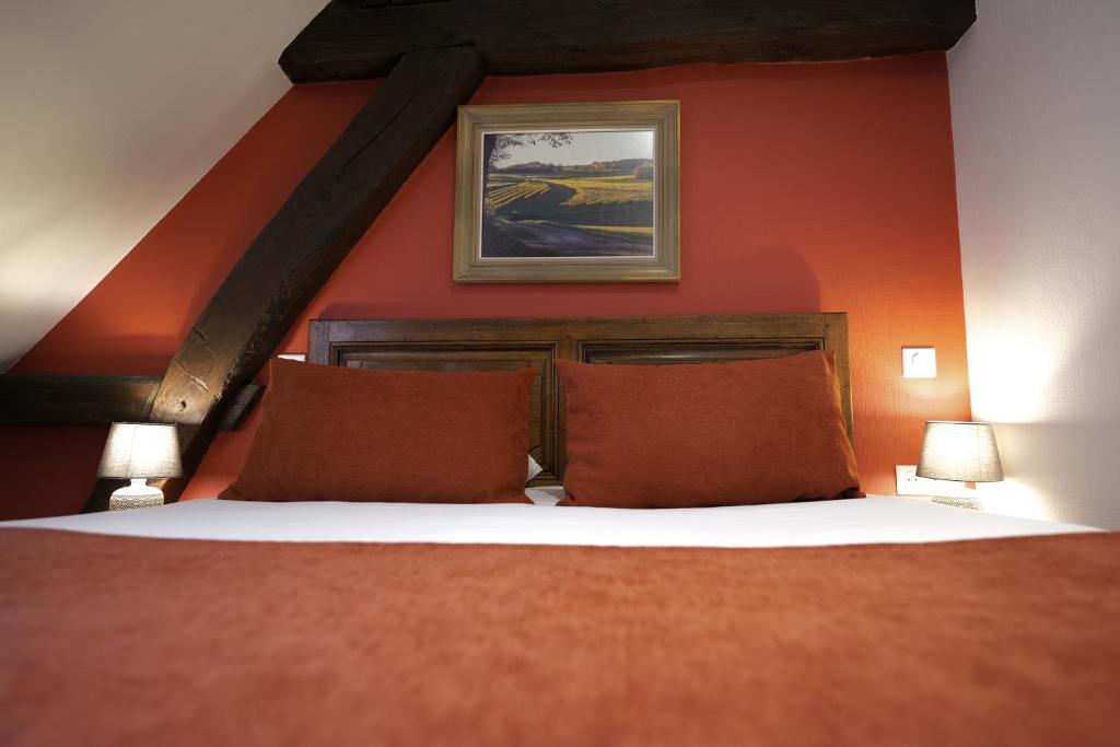 Postel nebo postele na pokoji v ubytování Hôtel Wilson - Teritoria