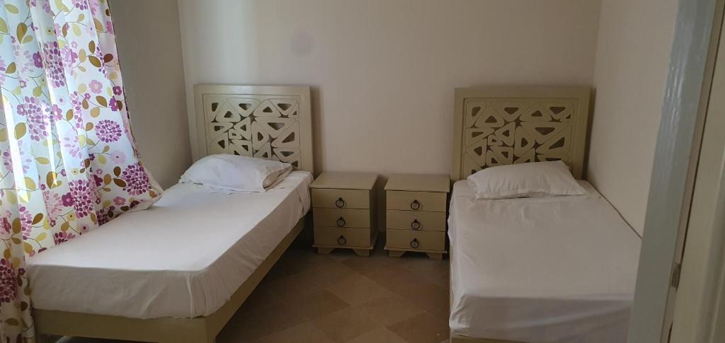 Postel nebo postele na pokoji v ubytování Residence CHAHD