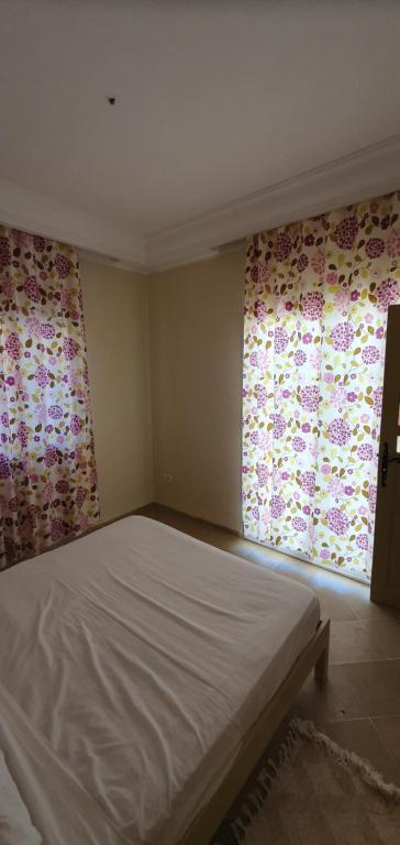 Postel nebo postele na pokoji v ubytování Residence CHAHD