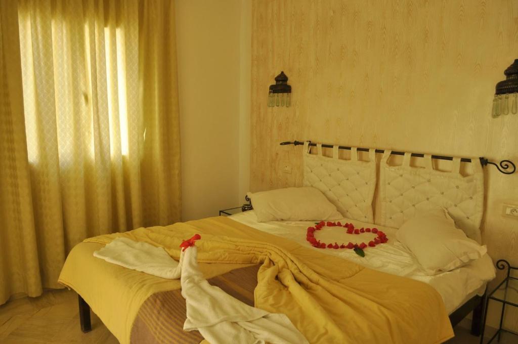 Postel nebo postele na pokoji v ubytování Residence CHAHD
