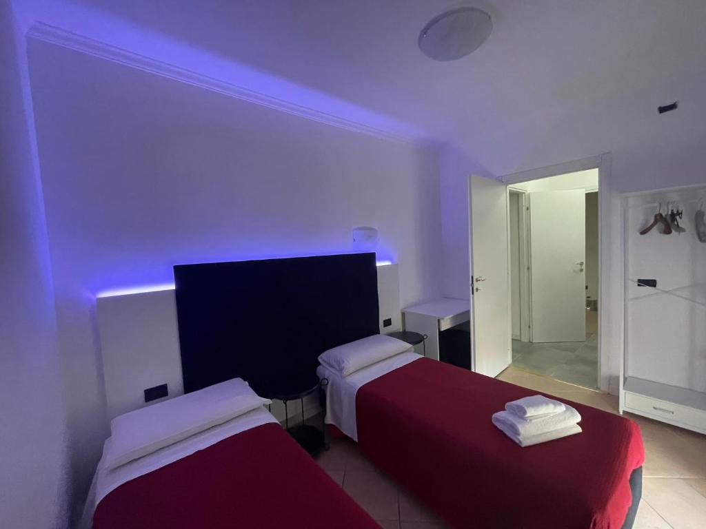 Postel nebo postele na pokoji v ubytování Villa Daniela