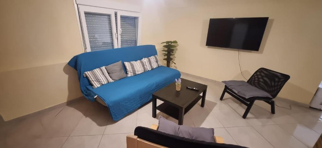 TV a/nebo společenská místnost v ubytování RAY APARTMENT
