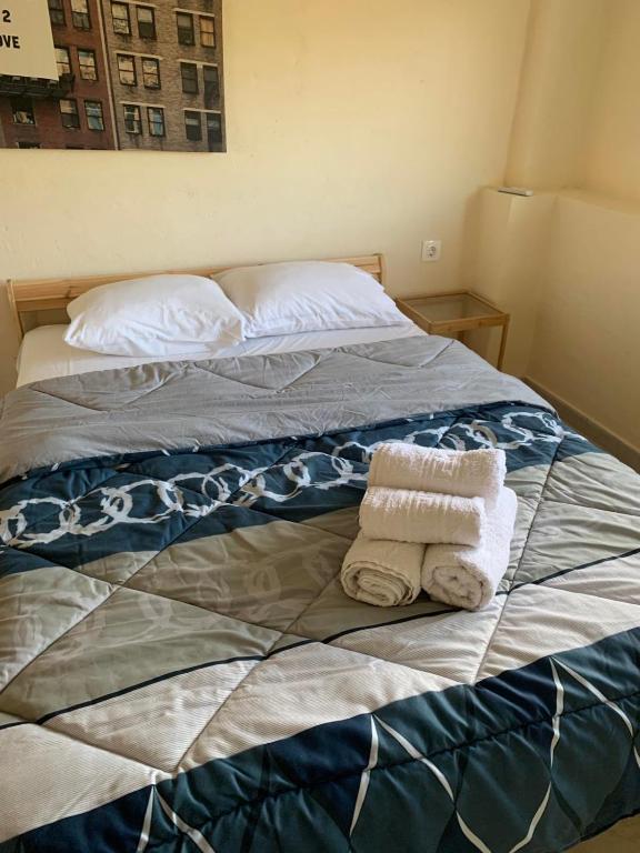 Postel nebo postele na pokoji v ubytování RAY APARTMENT