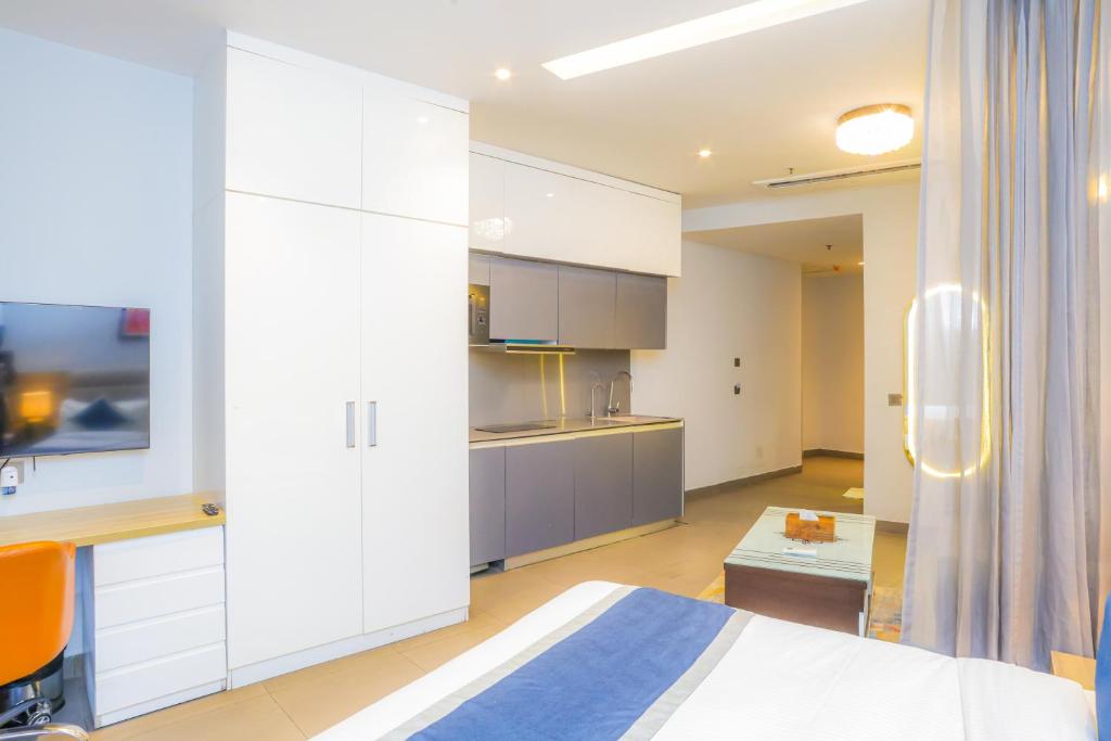 Postel nebo postele na pokoji v ubytování Hotel Livbox at Supernova