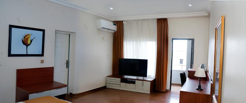 TV a/nebo společenská místnost v ubytování Kaslon Hotel