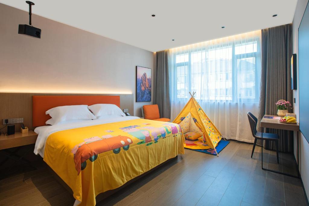 Postel nebo postele na pokoji v ubytování ME Hotel