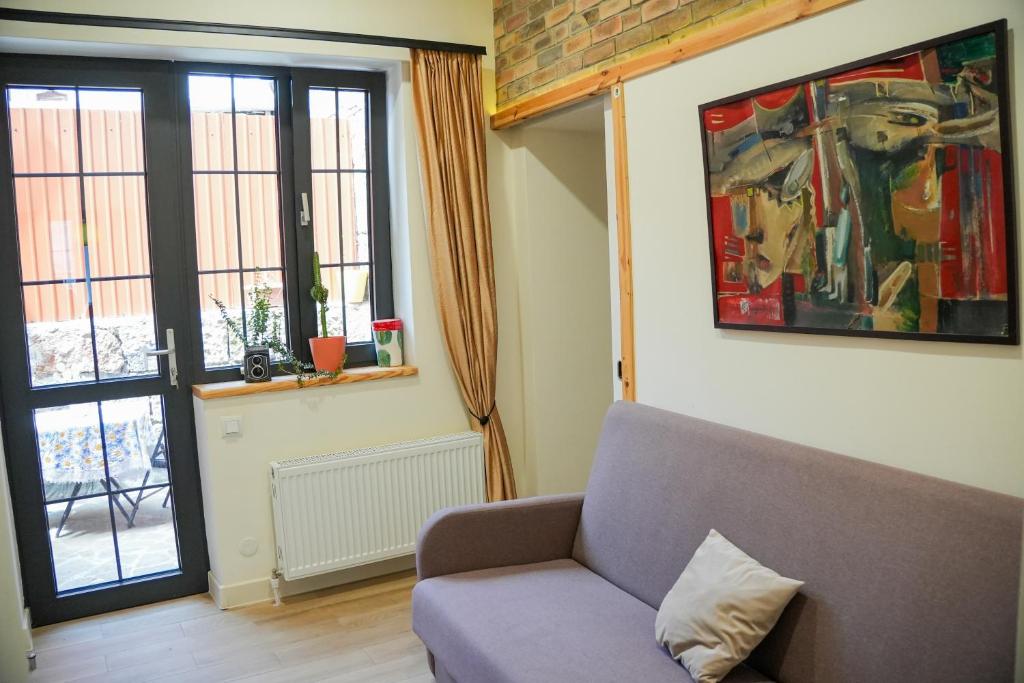 Posezení v ubytování Communa Guesthouse