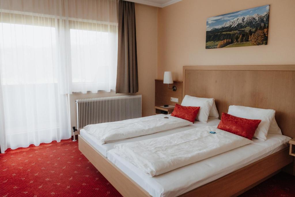 Postel nebo postele na pokoji v ubytování Pension Spreitzhof & Appartement Royer