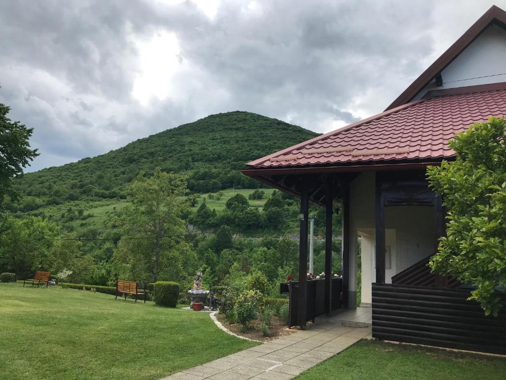 a house with a view of a mountain at Apartments Renata in Smoljanac