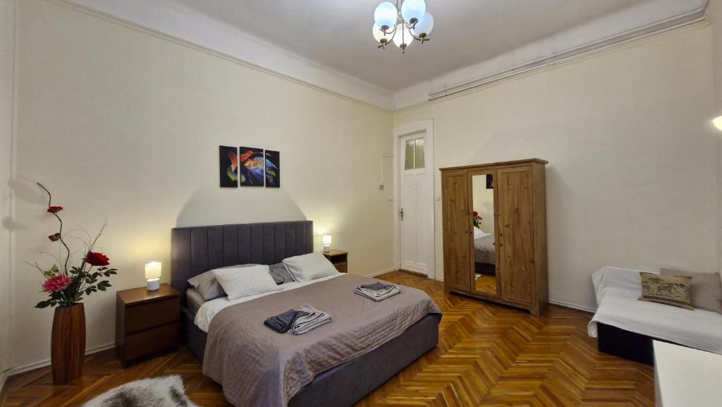 Posteľ alebo postele v izbe v ubytovaní River Center Apartment