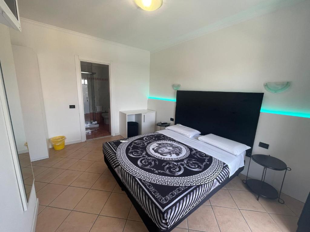 Postel nebo postele na pokoji v ubytování Villa Daniela