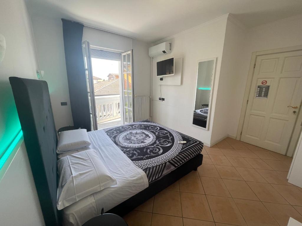 Postel nebo postele na pokoji v ubytování Villa Daniela