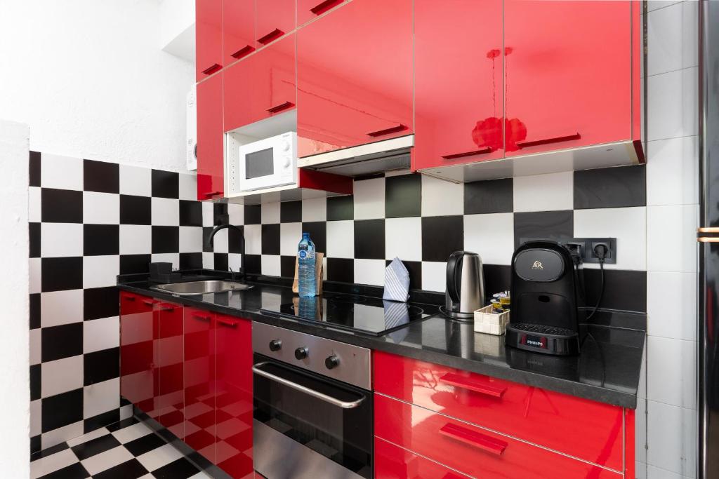 Kuchyň nebo kuchyňský kout v ubytování Dúplex Deluxe Apartment