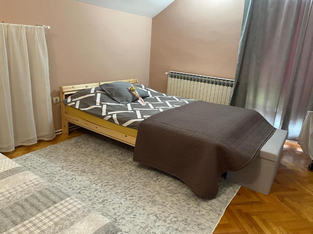 Postel nebo postele na pokoji v ubytování Apartman 1